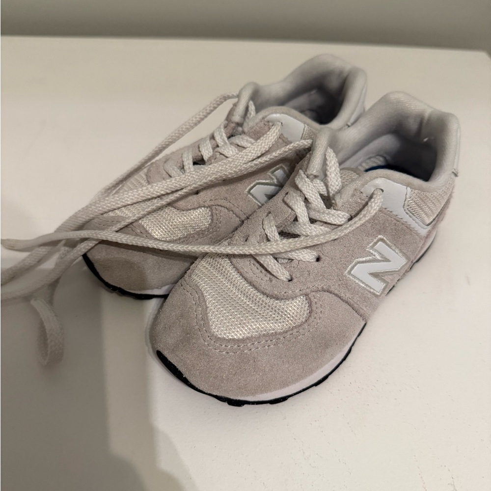 New Balance White and Blue Sneakers